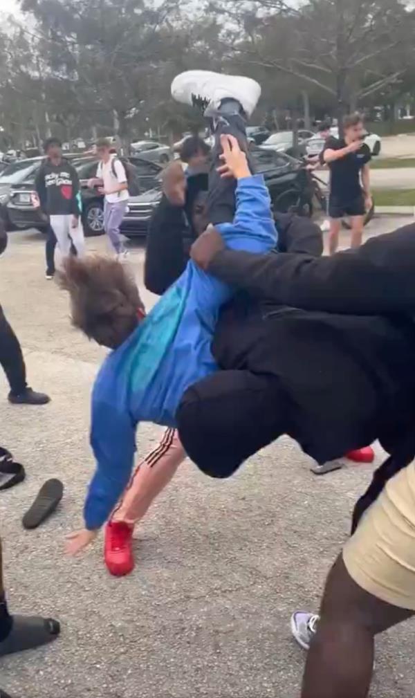 Student beaten by mob. 