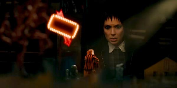 Lydia (Winona Ryder) watching Beetlejuice serenading her from the model in Beetlejuice Beetlejuice